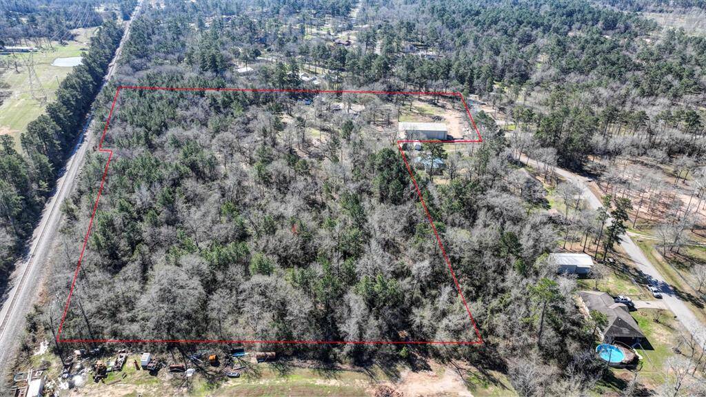 Boundary red line is approximate.  please look at the survey for exact measurements.  Plenty of potential with this piece of land with low taxes.