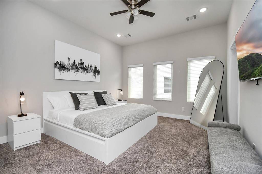 Primary bedroom with king size bed