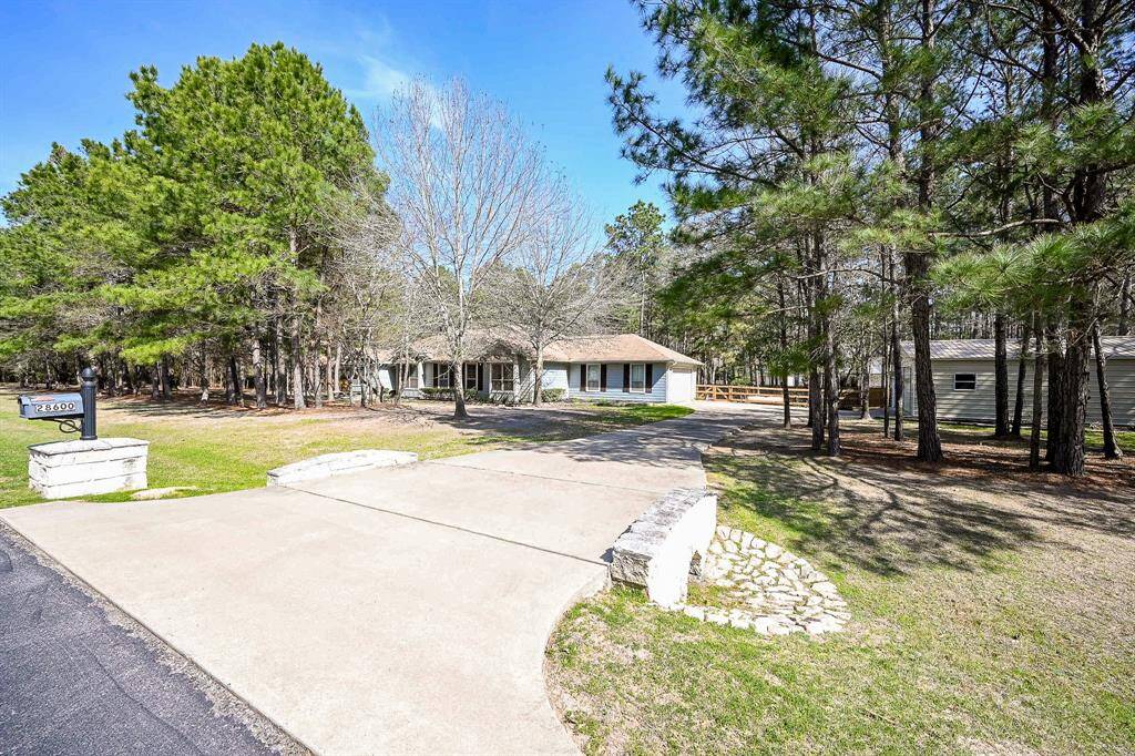 Welcome home to 28600 Equestrian Drive in Waller! This magnificent property sits on 1.5 acres of mature wooded splendor in the securely gated community of Saddle Creek Forest. Designed to be a "generational" home, this property features a total of over 4000 square feet living of space under a single roof, yet is capable of supporting the family who may need to work with members needing extra attention yet giving those special ones the independence they may still seek.