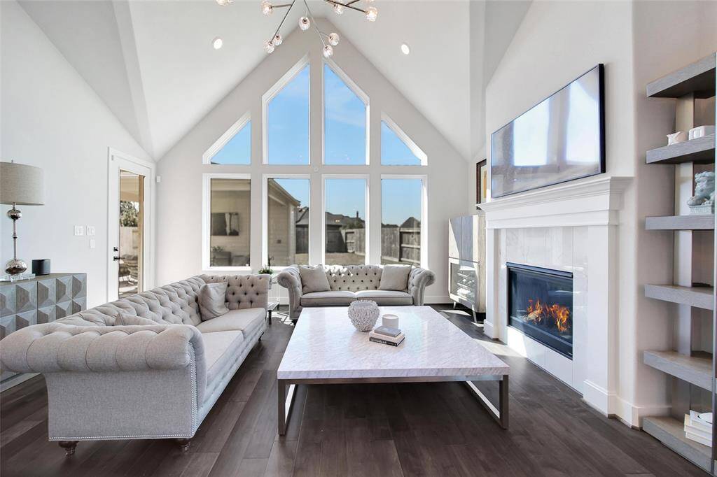 The upgraded point vaulted rear ceiling offers unrivaled architectural charm to the living room.