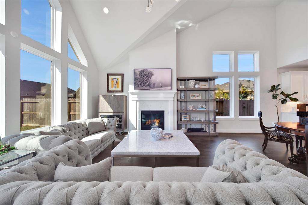 A gaslog fireplace adds warmth and ambiance to the living area.