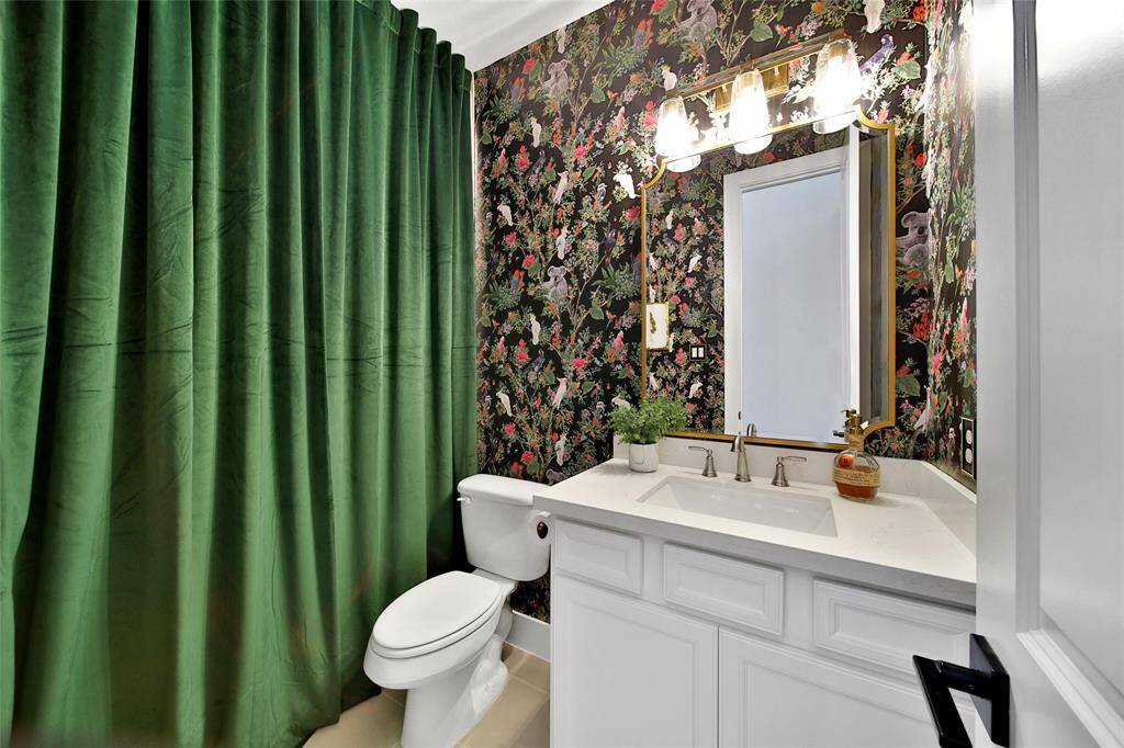 How Chic!! FULL BATHROOM DOWNSTAIRS located in the adjoining hallway outside the bedroom.