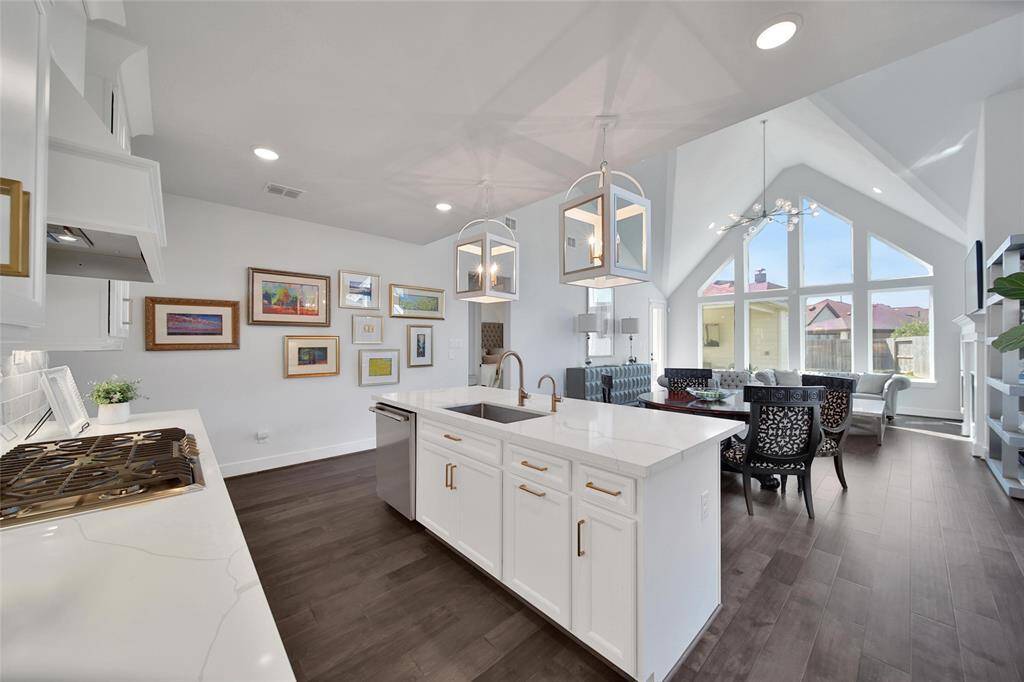 The kitchen, dining and living area flow easily into one another.