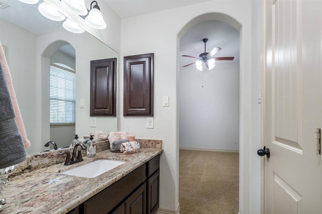 Vanity located off of secondary bedroom 2