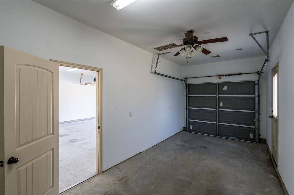 Third bay of the garage. If you don't use it for storage it would be an INCREDIBLE space for a workout room/home gym.