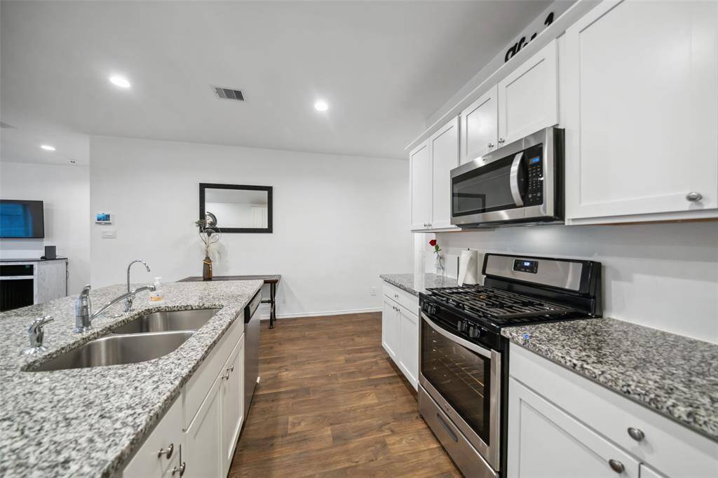 Comes equipped with gas stove and microwave.