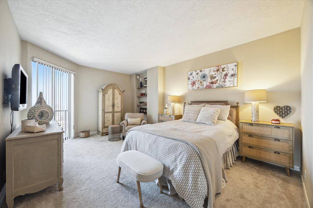 Another view of the primary bedroom