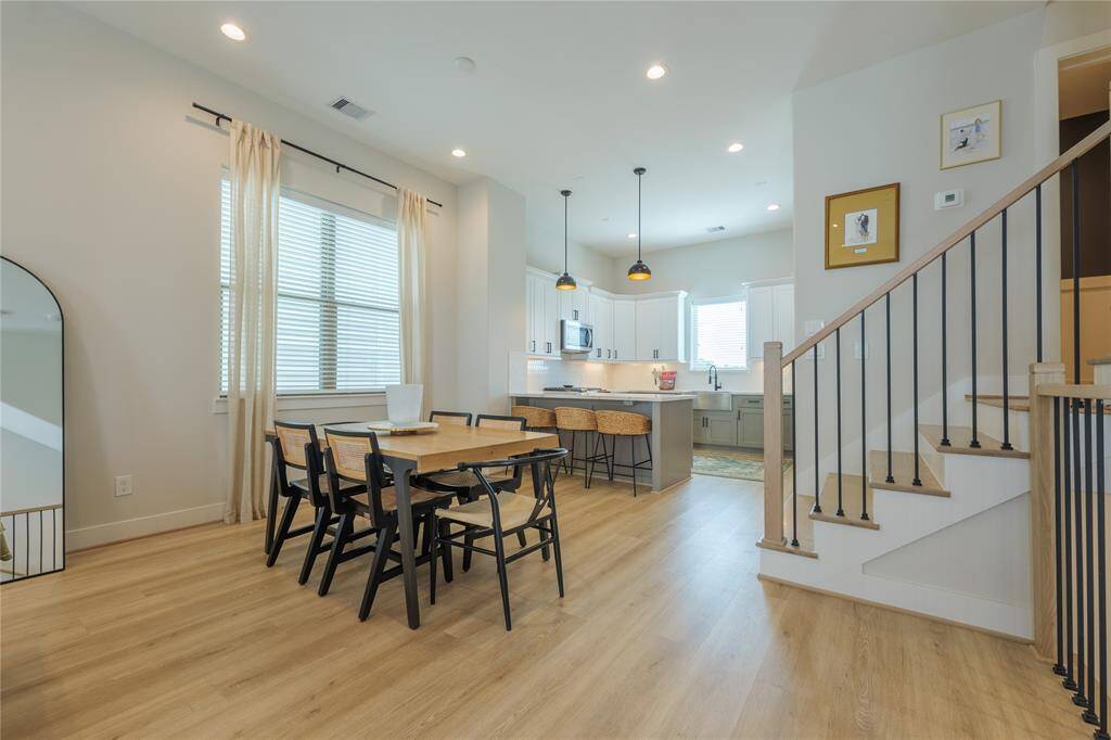Spacious dining room perfect for hosting.