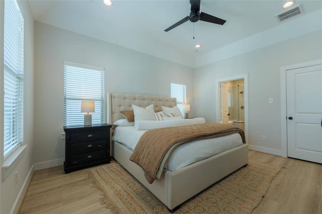 Primary bedroom has two walk in closets.