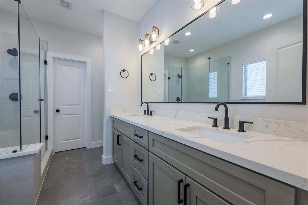 Primary Bathroom- dual vanities.
