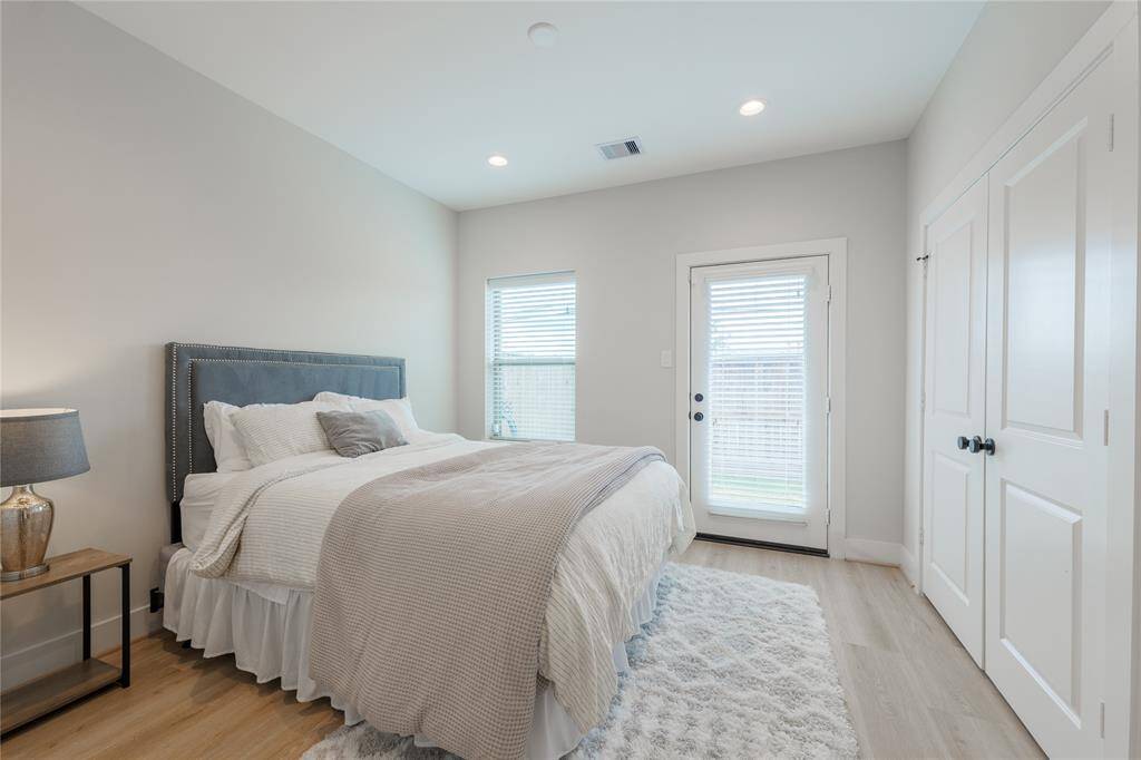Guest bedroom on first floor. Access to back yard.