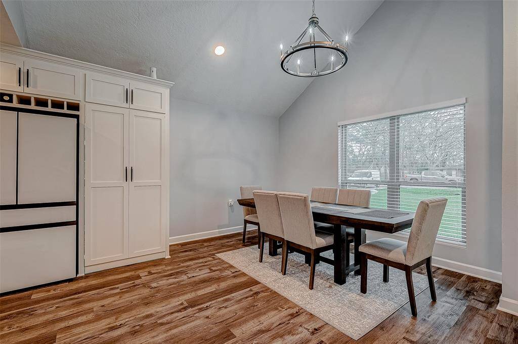 Dining Area- Door to the right of the fridge leads to a 60 sq ft pantry!