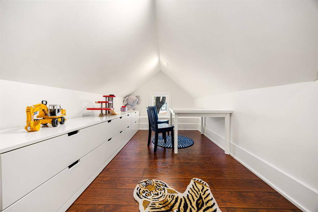 Charming upstairs loft area offers a versatile space perfect for a cozy study nook, home gym, or playful retreat. Filled with natural light and tucked away for added privacy, this flexible bonus space adapts to your lifestyle needs.