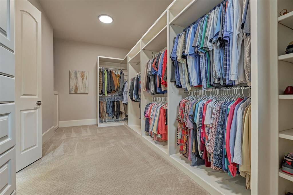 Primary walk-in closet.