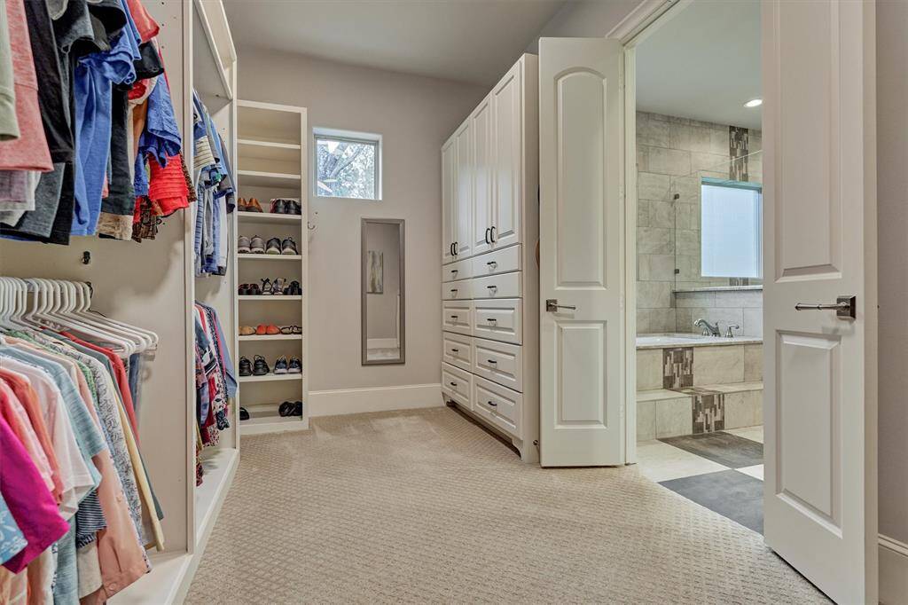Custom built-ins in Primary closet.