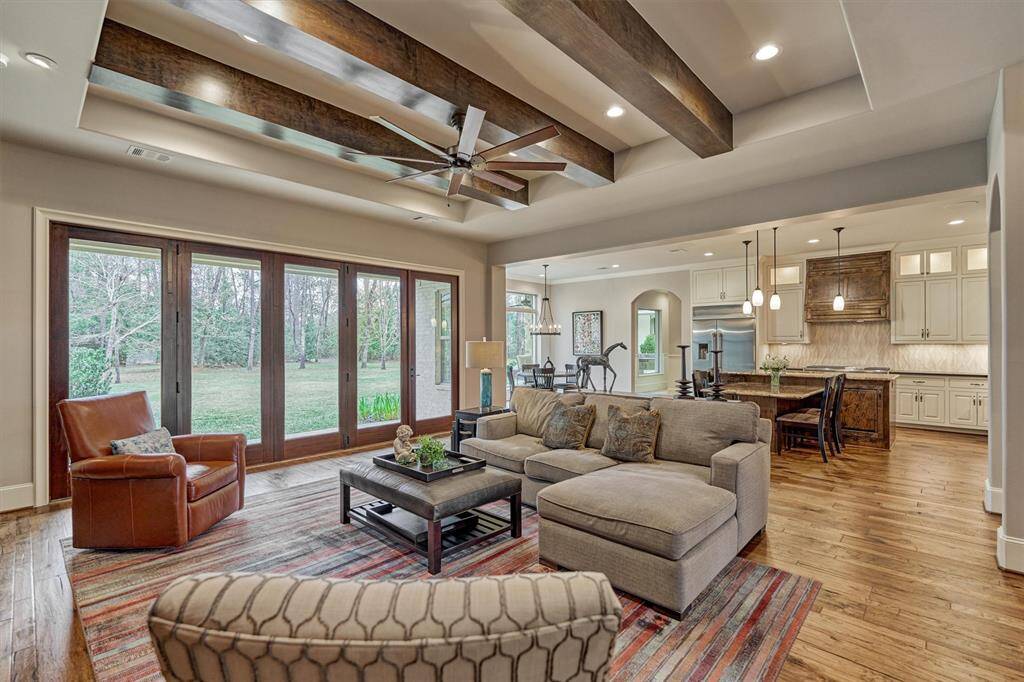 Living with slider glass windows brings in natural light and open to let the outdoors in.