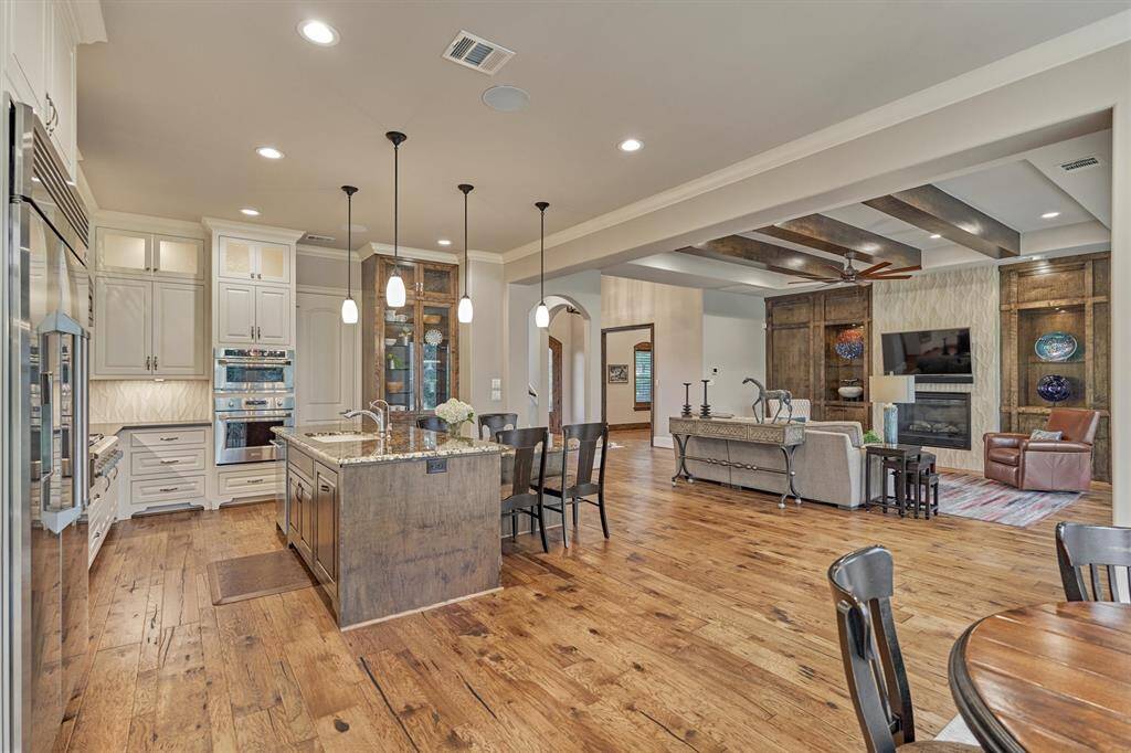 Dining area is open to Kitchen and Living spaces.