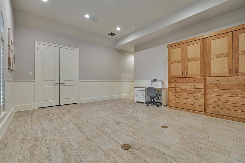 Large Second downstairs Bedroom with tile floors and ensuite bath.