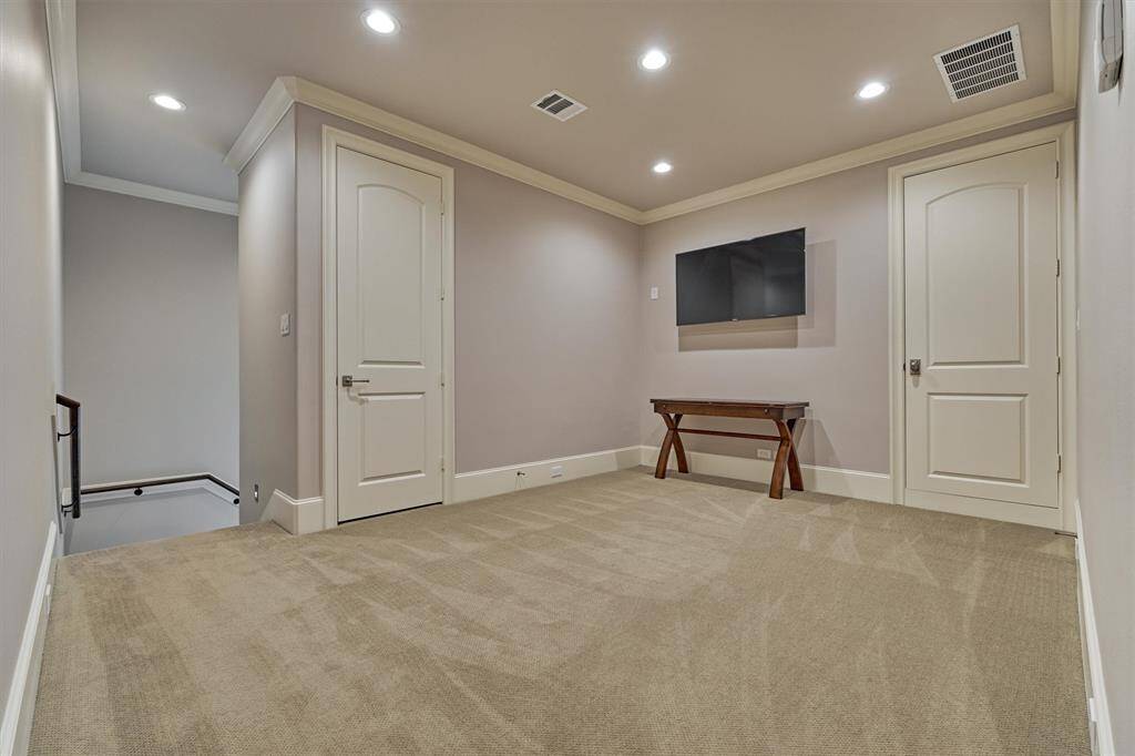 Large window for natural light on stairway.