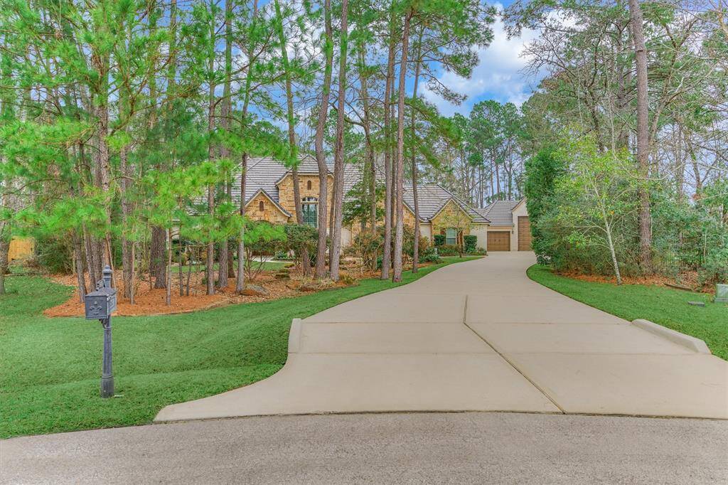 Extended driveway for privacy.