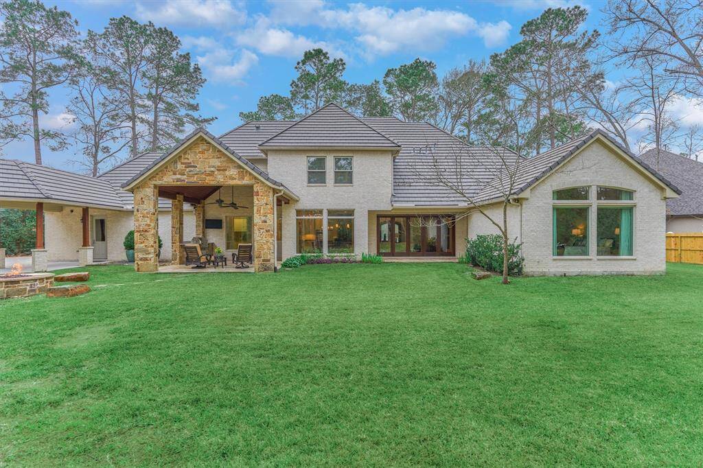 Tons of backyard space. Plenty of green space for play and pets. Ample room for pool.