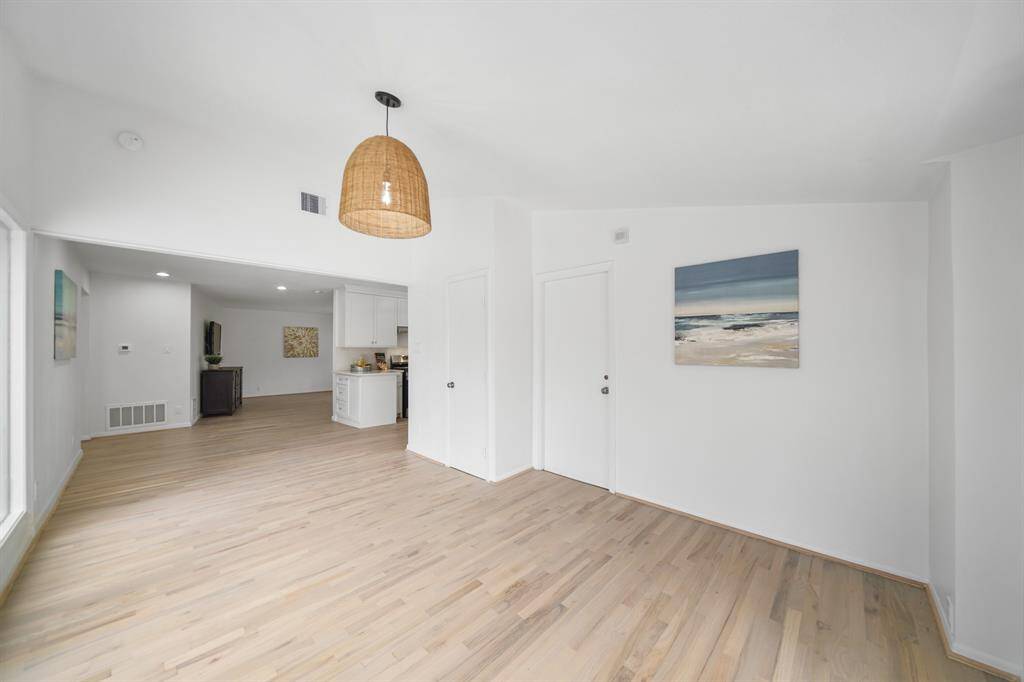 The home's two-car attached garage complete with washer & dryer connections is conveniently accessible from this area of the home.