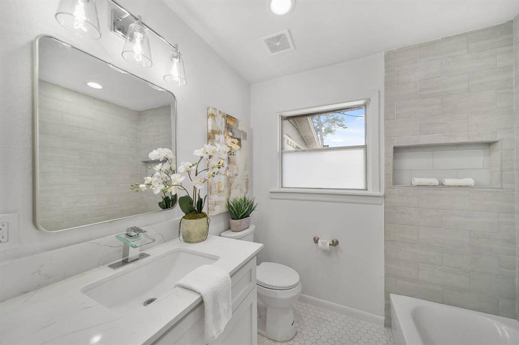 The bathroom tile flooring was updated in 2024.
