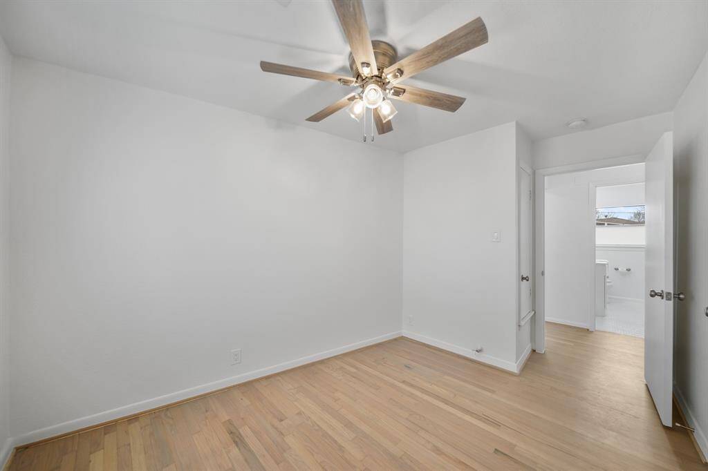 The home's full bath is conveniently accessible from all of the bedrooms.