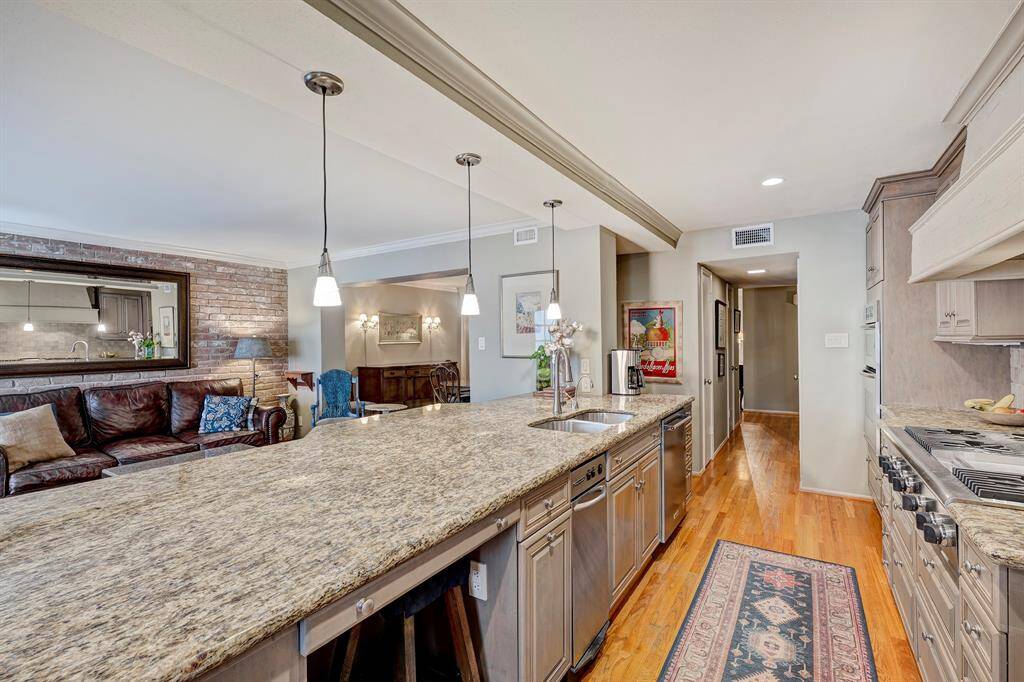 Grand kitchen with storage and nook for beverage refrig