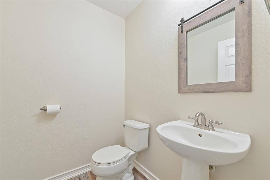 Convenient half bath downstairs.