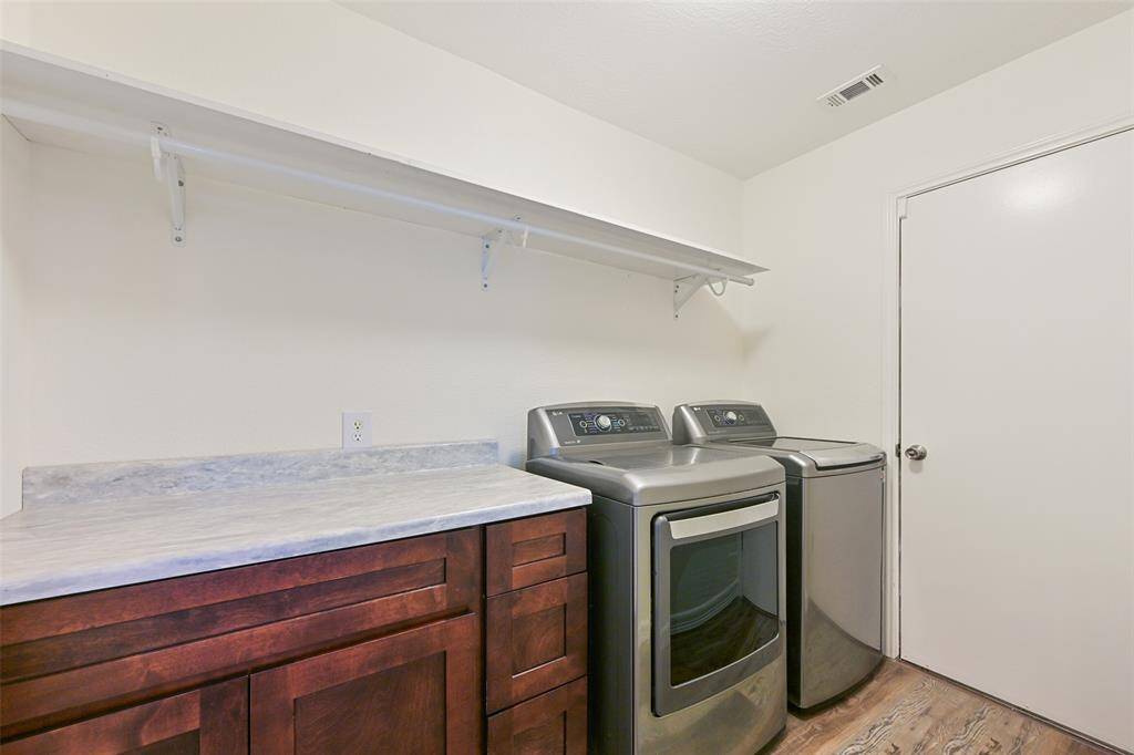 Extremely functional laundry room - washer & dryer stay