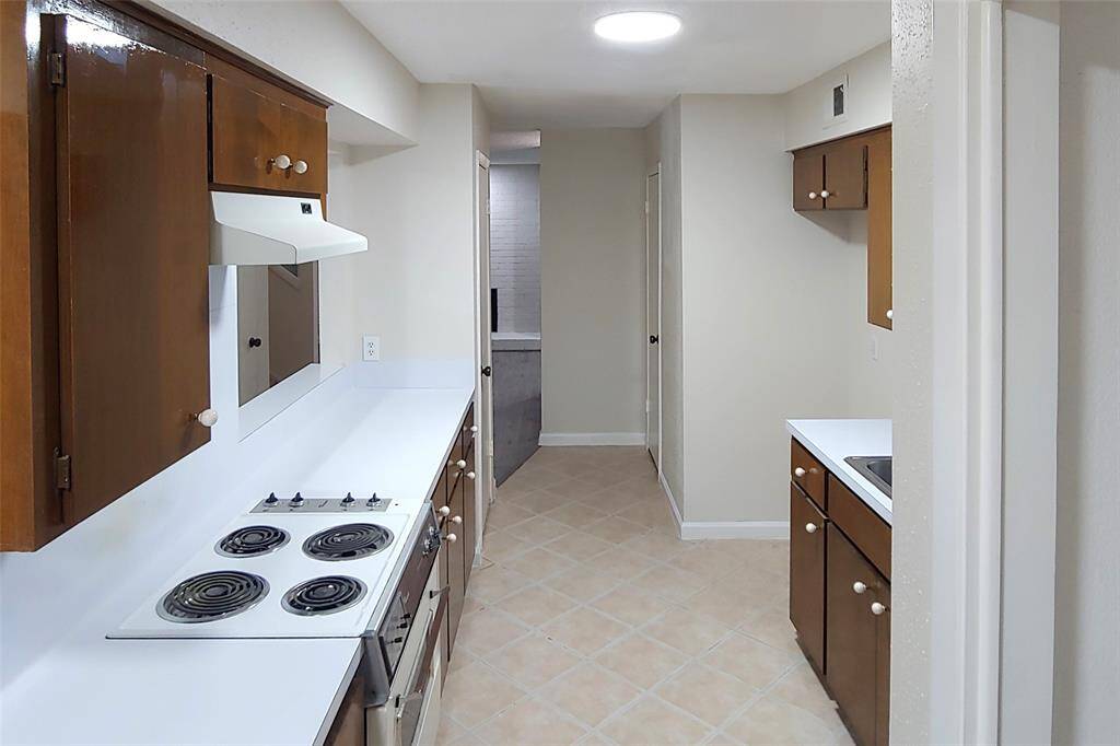 ENTERING KITCHEN VIA GARAGE