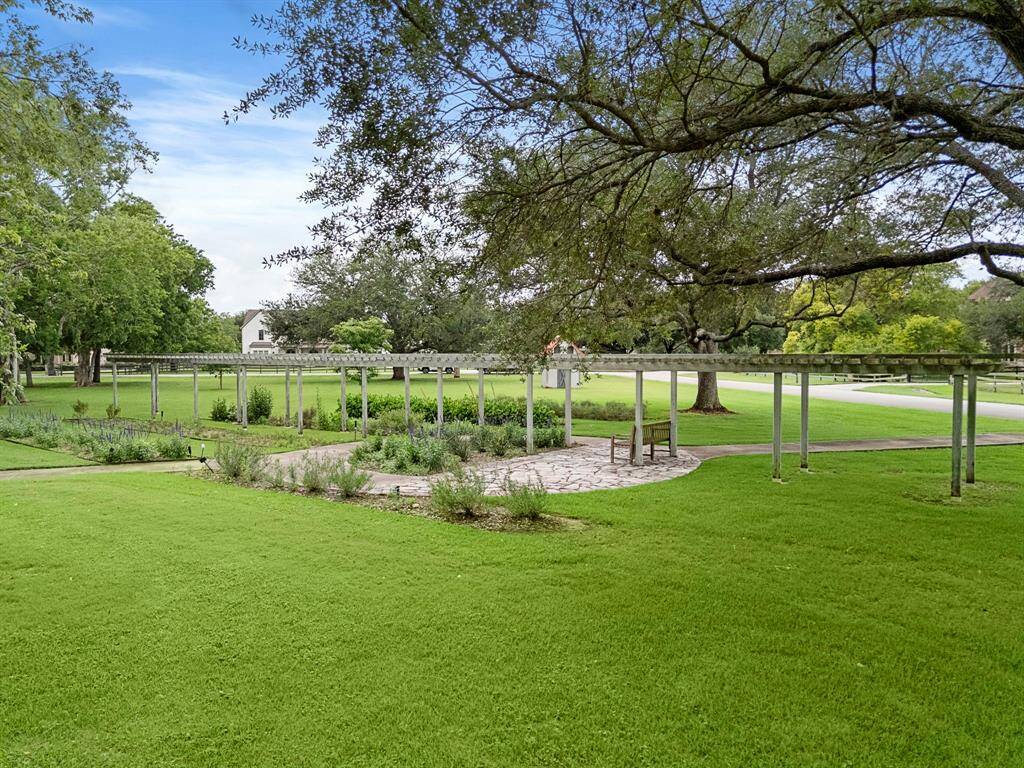Located within walking distance is a common garden area for residents.