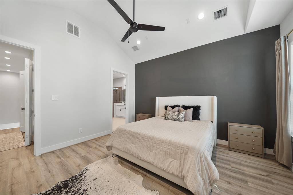 The utility room sits in the corridor just between the owner's suite and secondary bedrooms.