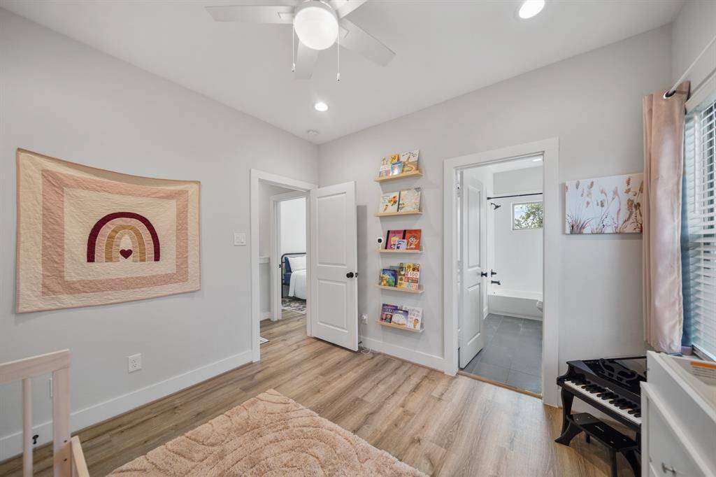 Semi-private access to the full bath shared with the second bedroom is shown on the right.