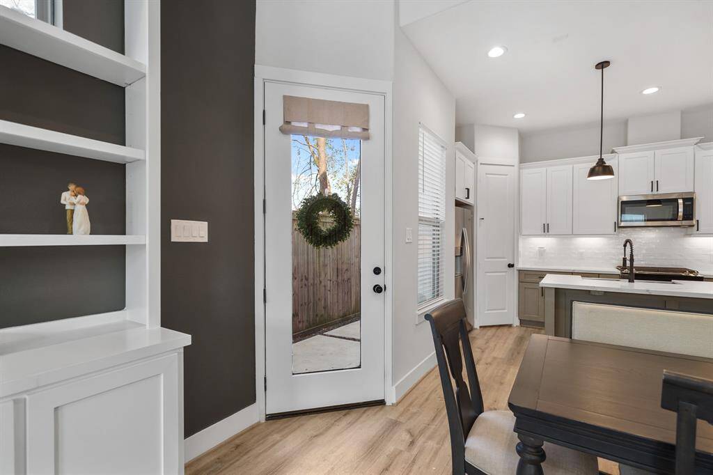 Luxury vinyl plank hardwood floors are featured throughout the home with 10' ceilings on the first level of the home and 9' ceilings on the second level.