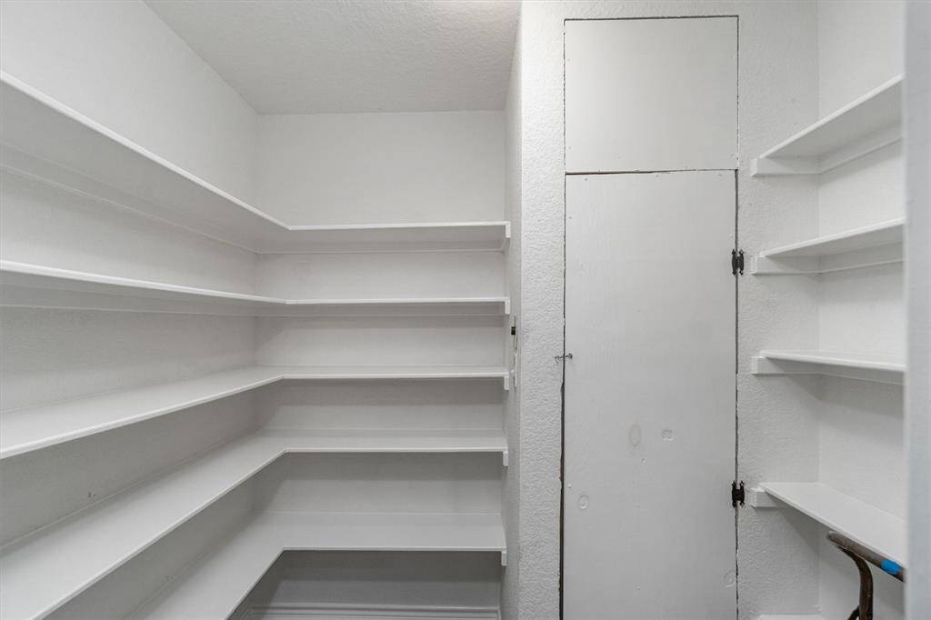 Large walk in pantry and the dumbwaiter is in the door