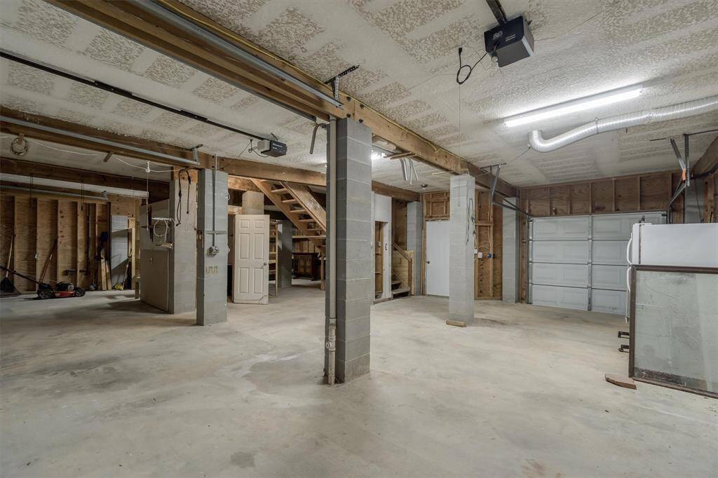 One side of the garage has doors on both sides which is good for a nice breeze. This area would be perfect for a bar area