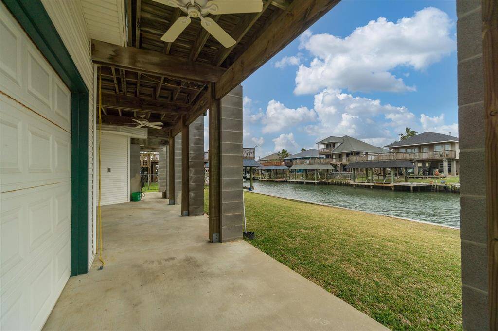 Waterside of home with plenty of room for relaxing. Just add a boathouse!