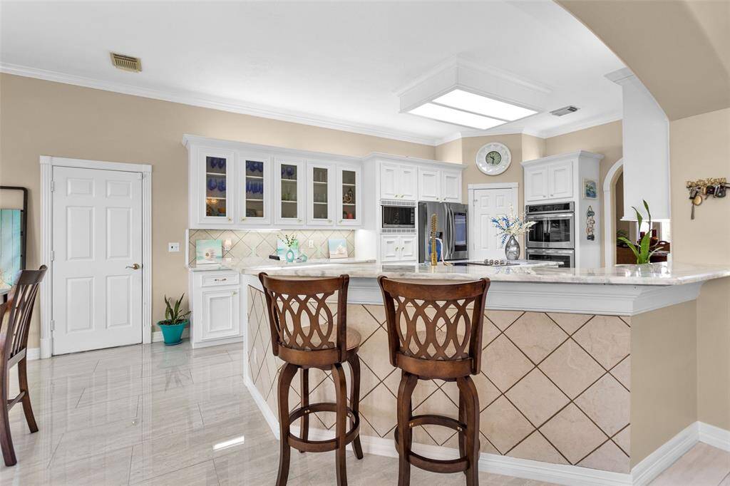 Living open to kitchen and entry