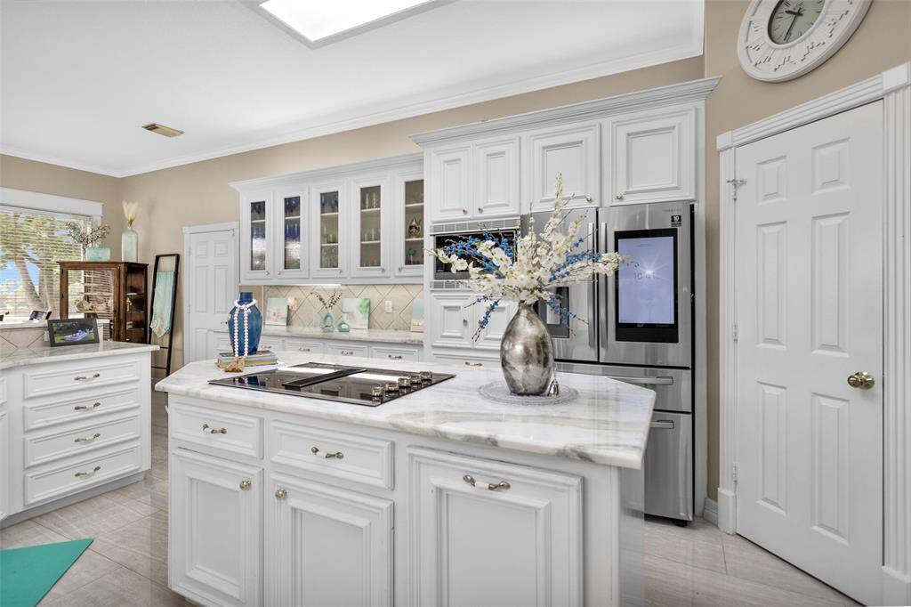 Under cabinet lighting and island kitchen.