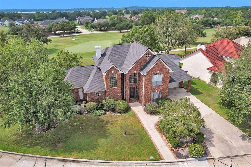 2 story home located on the golf course in the gated subdivision of Bentwater on Lake Conroe.