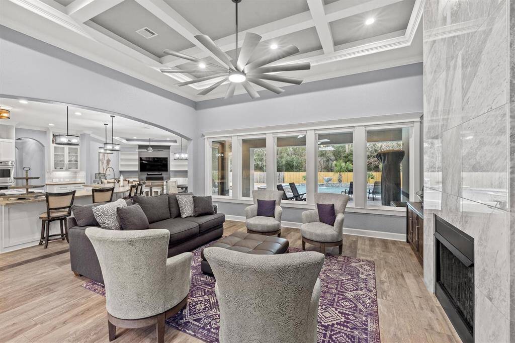 Living room overlooks patio and pool!