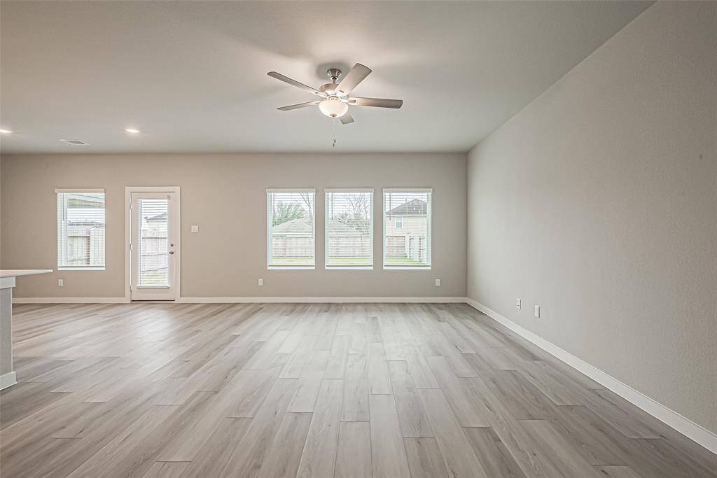 The spacious living room gets plenty of natural light!