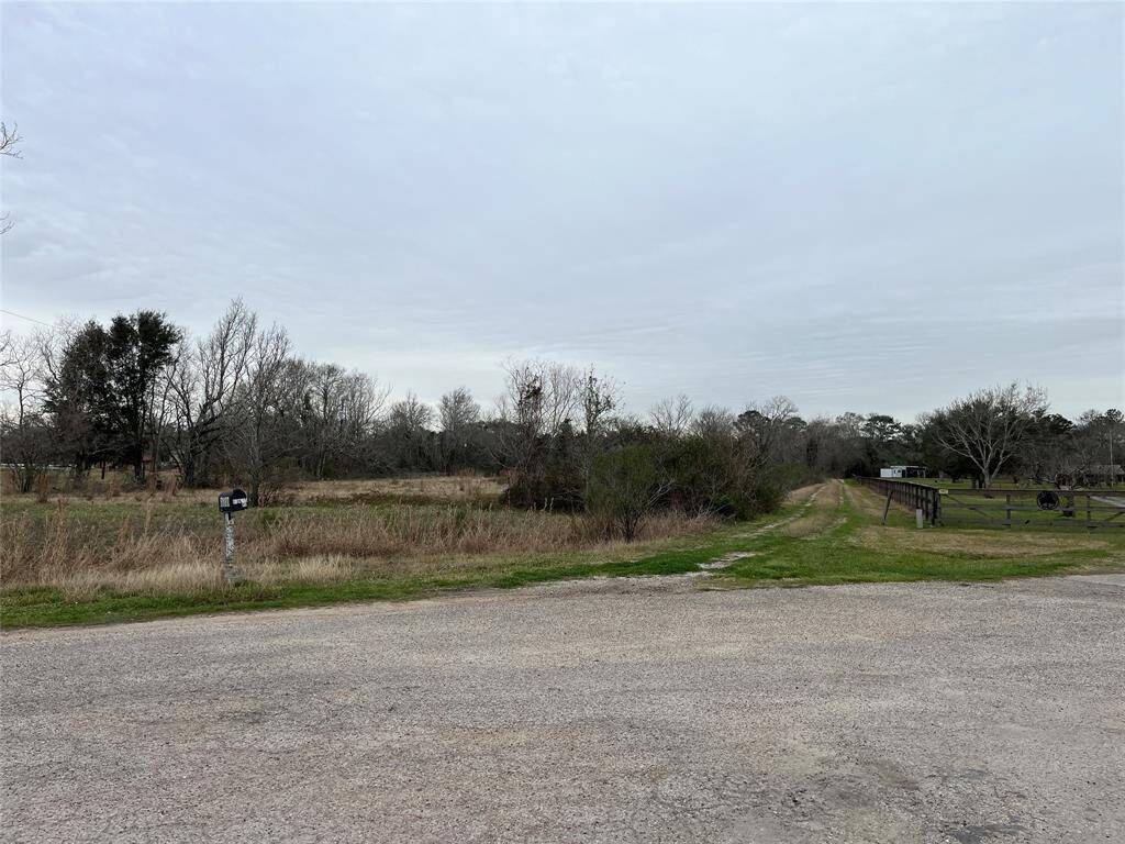 Burnett is a dead end cul-de-sac and your new 5.19 acre homesite offers the privacy of country living, yet you are still very convenient to Hwy 6. This is your driveway.