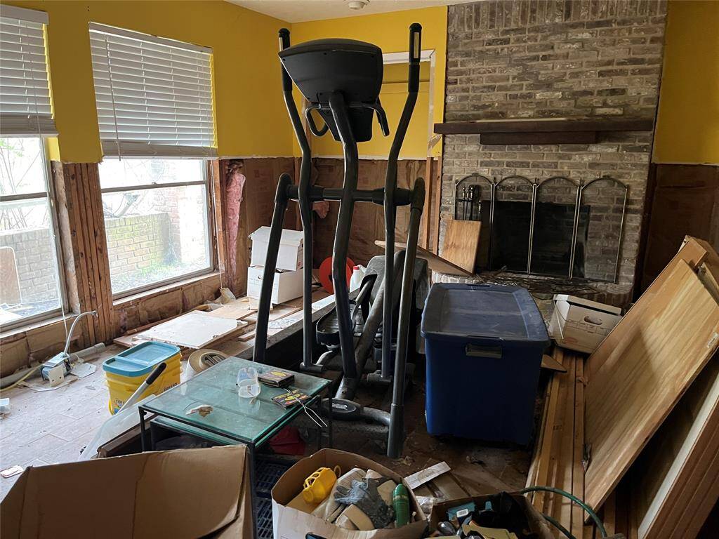 Living area and fireplace downstairs.
