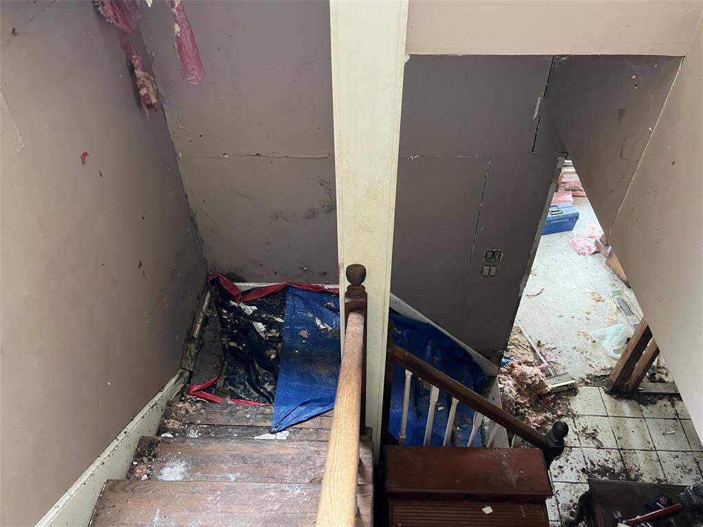 Looking down the stairs at the area of the leak.