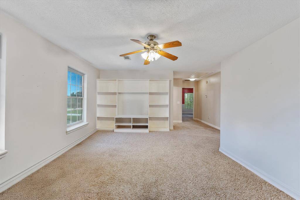 Gameroom area with built ins virtually unstaged