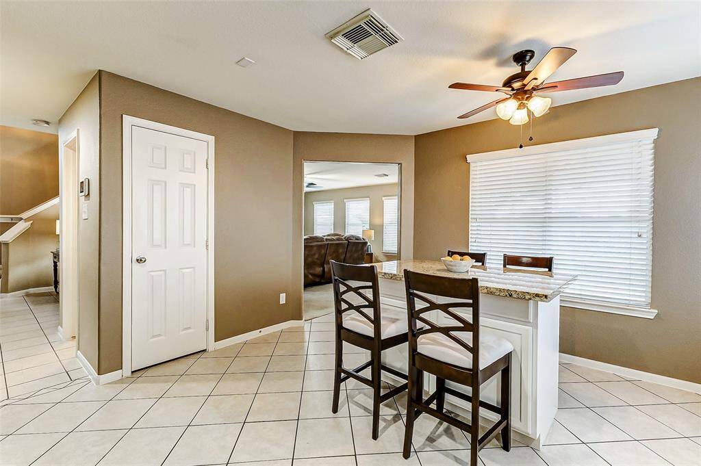 The breakfast bar gets lots of natural light all during the day making it a bright and happy place to be.