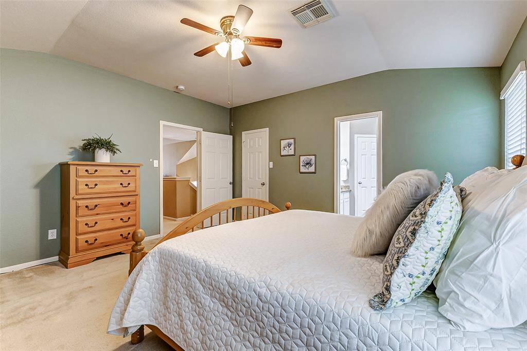 The primary bedroom is spacious and the perfect place to rejuvenate.